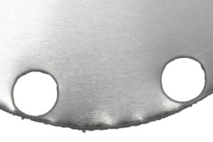 Close-up image of water jet cut stainless steel Equilibar diaphragm
