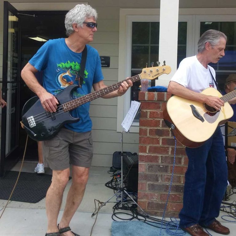 Electronics Engineer Philip Correll on guitar