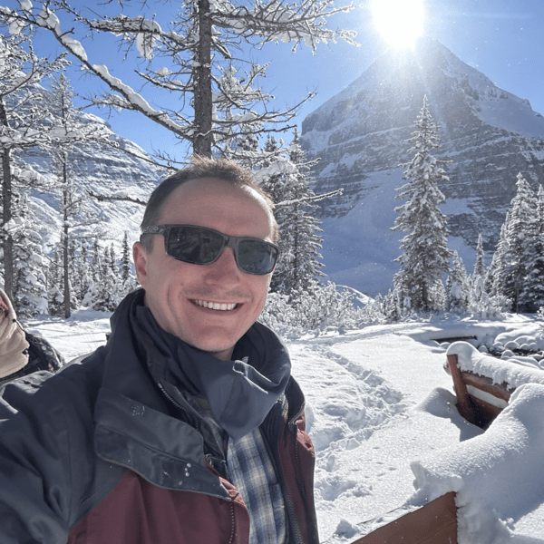 Ryan in Banff with snow and sun