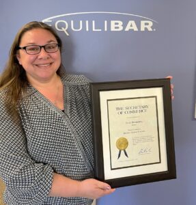 Julie with NCDEC plaque